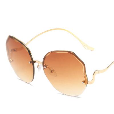 China Fashion Sunglasses Vintage Eyewear Lady Sun Glasses Shades UV400 Rimless Women Sunglasses for sale