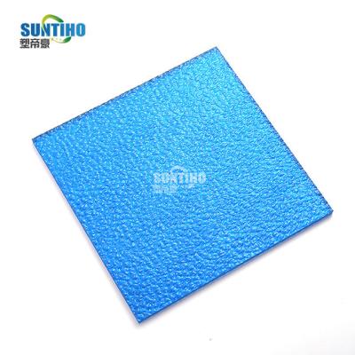 China 100% waterproof 3mm 4mm polycarbonate embossed sheet roll price for advertising equipment&roof&greenhouse for sale