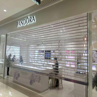 China Transparent Anti-theft Polycarbonate Roller Shutter Door Slats For Shopping Mall for sale