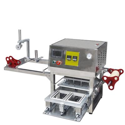 China Plastic Food Packaging Machine Food Container Sealing Meal Table Top Heat Manual Tray Sealer Machine Maker for sale