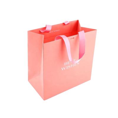 China Recyclable Custom Print Your Own Logo Luxury Matt Boutique Package Cardboard Shopping Orange Paper Bags for sale