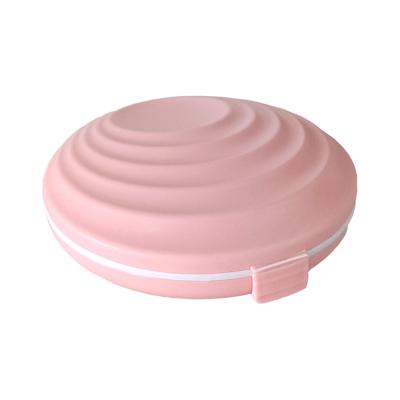 China Round Shape 7 Day Pill Box Plastic Organizer Pill Case For Daily And Travel Use 106*100*36mm for sale