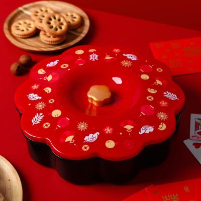 China Freshness Preservation Custom Printing New Year Flower Shape Plastic Candy Box Chinese Dry Fruit Tray for sale