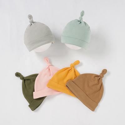 China Wholesale 100% Cotton Organic Baby Hat Plain Dyed Hat For Babies 0-3M/3-6M/6-12M/12-18M Unisex for sale