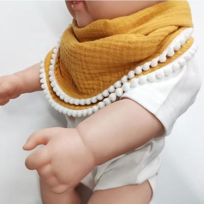 China Instant Organic Cotton Baby Bibs Cloth Bibs Double Layer With Pom Pom Trim 0-3T for sale