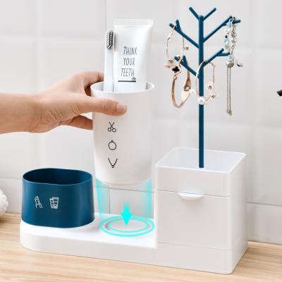 China Durable Multifunctional Bathroom Jewelry Organizer Plastic Magnetic Cup Toothbrush Holder Viable for sale