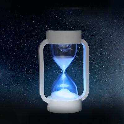 China Modern Portable Indoor Kids Room Decoration Hourglass LED Night Light Bedroom Table Lamp for sale