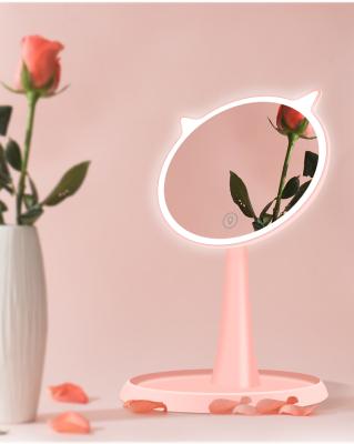 China Modern Makeup Mirror with Beautiful Pink/White ABS Touch Screen Led Light Weight Standing Cosmetic Vanity Mirrors on Desk for Bedroom for sale