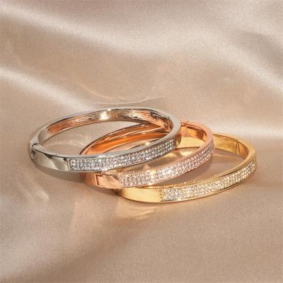 China Punk Oval Gold Plated Bangle Set Micro Zircon Bangle Clasp Titanium Stainless Steel Open Jewelry for sale