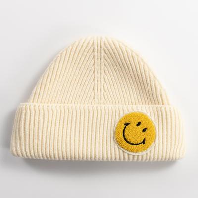 China Hotel and resort Autumn Winter Kids Girls Fashion acrylic knit hat pom pom beanie for sale