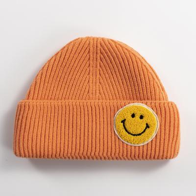 China Wholesale Hotel and Resort Fashion Multicolor White Unisex Knit Beanie Hat Custom Logo for sale