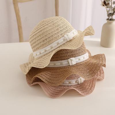 China Fashional Summer Wide Brim Bucket Straw Hat Raffia for Kids Travel Kids Straw Hats Floral Beach Sunscreen Sunhat for sale