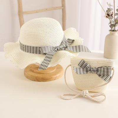 China New Fashional Kids Summer Outdoor Beach Sun Straw Bag Straw Bucket Hats Wide Brim Panama Sun and Hat for sale