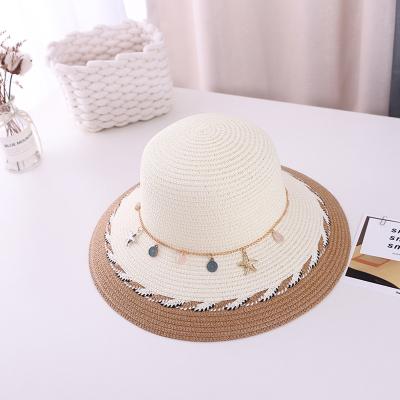 China Raffia Wide Brim Bucket Hat Straw Beach Sun Hat High Fashional Quality Handmade Wholesale Summer For Woman for sale