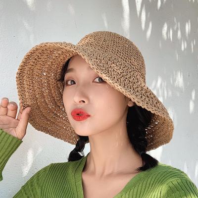 China Paper Fashional Straw Beach Hat Fashion Sun Protection For Women Wholesale Foldable Straw Sun Hat Wide Brim Bucket Shopping for sale