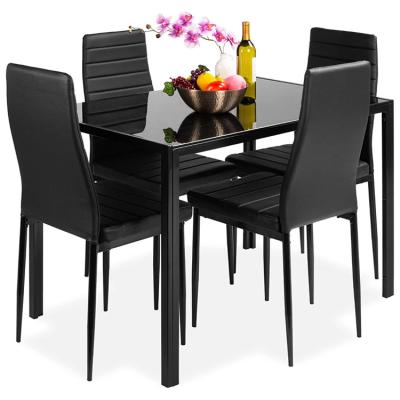 China Modern Dining Room Contract Space Dinette With 4 Faux Leather Table Top And Metal Frame Chairs Kitchen Dining Table Set for sale