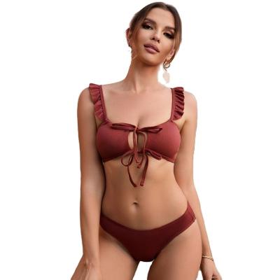 China 2023 new sexy plus size swimwear beach wear peplum strap hollowed out solid color lace up bikini for sale