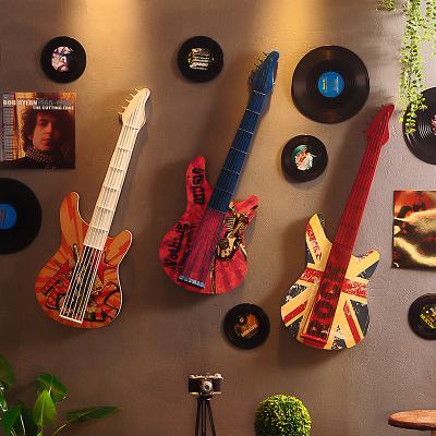 China Eco-friendly American Bar and Cafe Iron Guitar Wall Decoration Creative Wall Decoration for sale