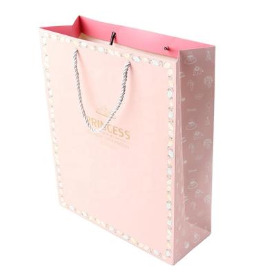 China Recyclable Pink Jewelry Packaging Paper Bags With Logo For Gift for sale