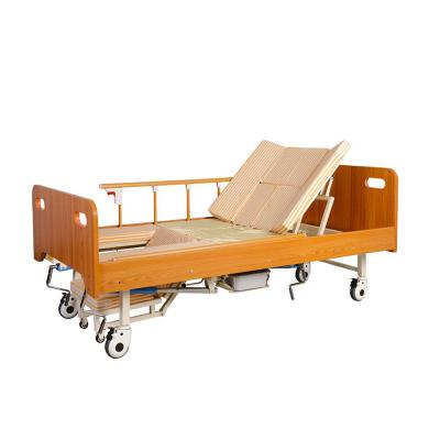 China Hospital Nursing Home C02-Y Wooden headboard and footboard manual household nursing bed elderly hospital home care nursing medical bed for sale