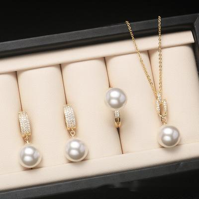 China The most popular FASHIONABLE round three-piece shell pearl necklace jewelry earring and shell pearl necklace earrings rings set for sale