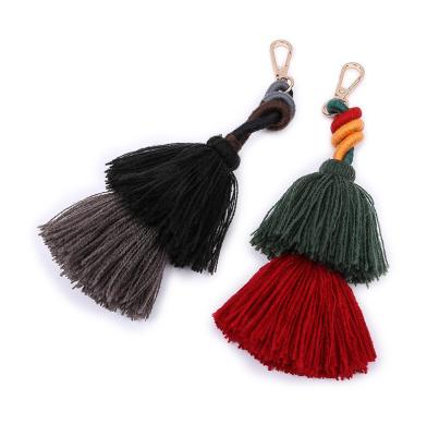 China New Designed Cute Bohemian Fur Ball Tassel Metal Buckle Birthday Keychains Woman Long Key Chain Bag for sale