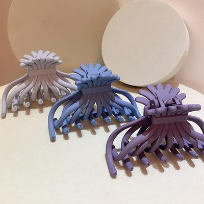 China Fashion most popular morandi blue hair clip ins matte plain french hollow cross korean hair claw clips for sale