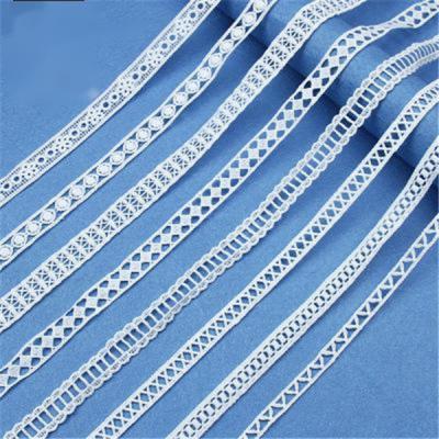 China 2021 water soluble new lace fabric white fine cotton hollowed-out milk silk barcode water soluble embroidery for sale