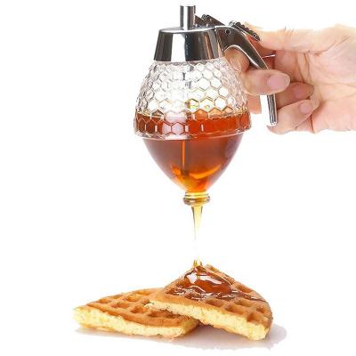 China Freshness Preservation Baking Glass Honey Dispenser Non Leaking Honey And Syrup Bottle Pot Dispenser for sale