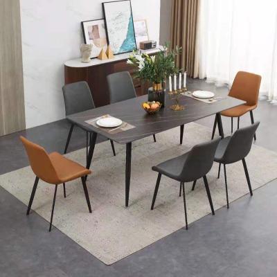 China (Others)Adjustable Apartment Household Nordic Modern Minimalist Luxury Black Marble Agglomerated Stone Dining Tables With Metal Legs for sale