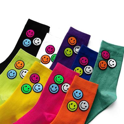 China High Quality Funny Cute Socks QUICK DRY Premium Labeling Smile Face Bangs Girls Cartoon White Crew Socks for sale