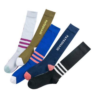 China Different Fashion Styles QUICK DRY Left and Righ Feet Compression Knocks High Knee Women Running Stripe Ridding Socks for sale