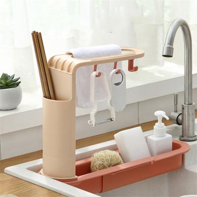 China Retractable Foam Soap Dispenser Drain Sink Rack Holder Adjustable Shelf Kitchen Dish Soap Sponge Drainer Storage Racks for sale