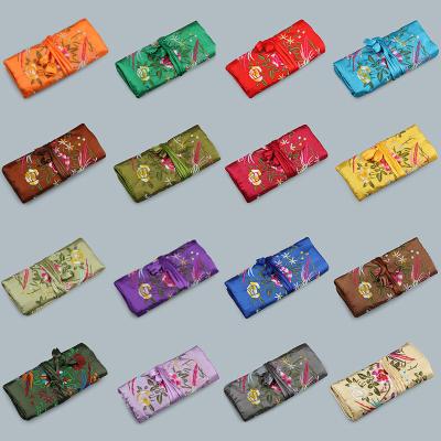 China Handmade Embroidery Brocade Roll Bags Jewelry Organizer Case Chinese Lucky Pouches Silk Bags for sale