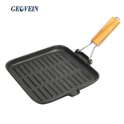 China Durable Cast Iron Wood Handle Cast Iron Non-Stick Grill Pan With Folding Handles for sale