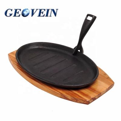 China Minimalist Hot Sale Cast Iron Steak Dish Sizzling Dish with Wooden Base for Home Kitchen and Restaurant for sale