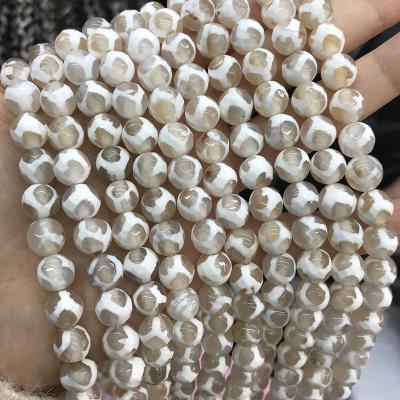 China Fashionable 10mm Faceted Polished Old Fashion Antique Style One Line Mix Eye Round Tibetan DZI Agate Beads for sale