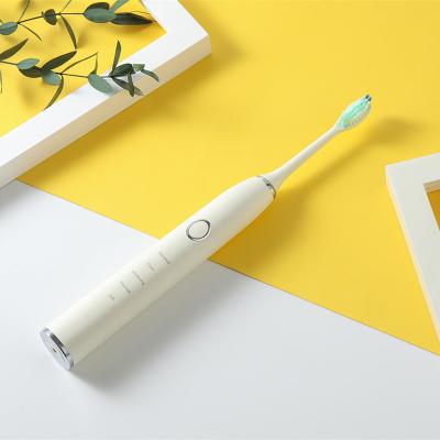 China Logo 21 Free Modes Frequency Cleaning Minimalist Wireless Charging 3 Sonic Electric Toothbrush for sale