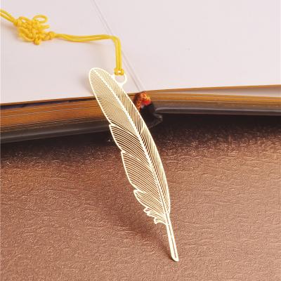 China Cheap Creative Europe Metal Bookmark Gifts Stainless Steel Feather Custom Etching Metal for sale