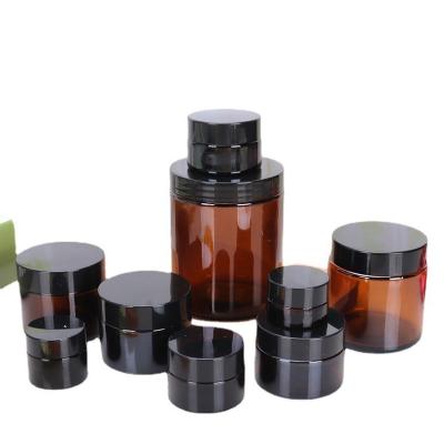 China 15ml 20ml 30ml 100ml Home Empty Luxury Aroma Candle Holder Home Decoration POSINDA Brown Scented Candle Jar With Lids for sale