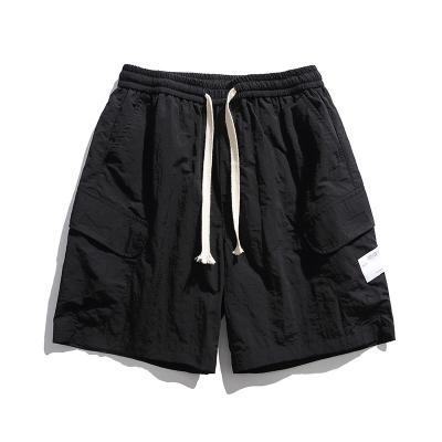 China Hot Selling 100% Hot Sale QUICK DRY Black Color Casual Nylon Jogger Pocket Sportswear Shorts With Logo Accepted Customized for sale