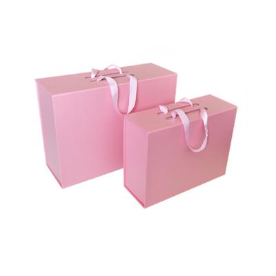 China Recycled Materials Custom Magnet Luxury Magnetic Paper Folding With Ribbon Handle Closure Gift Box for sale