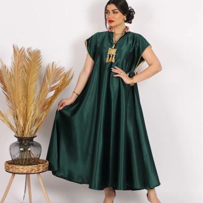 China Middle Eastern Summer Viable V-Neck Plus Size Women Dress Satin Solid Color Long Skirt Tassel Decorated Nationality Maxi Dress Ladies for sale