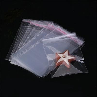 China 1000pcs/bag poly 10x17cm transparent thick clear self-adhesive cellophane plastic resealable plastic bags for sale