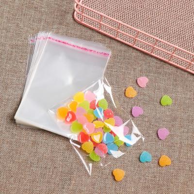 China 1000pcs Thick Clear Safety 10x15cm Self Adhesive Cellophane Packing Small Transparent Poly Sealing Plastic Candy Treat Resealable Bags for sale