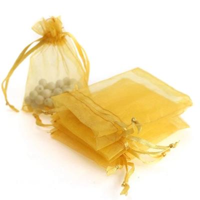 China Custom Drawstring Organza Bags Everyday Christmas Halloween Gift Transparent Packaging Bags Yellow for sale