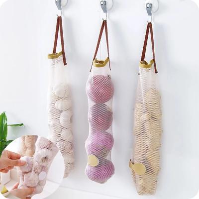 China 1PCS Kitchen Vegetable Potato Garbage Garbage Bag Holder Daily Holder Hanging Garlic Food Saver Mesh Fruit Ginger Organizer Container for sale