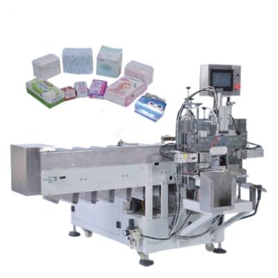 China Low Cost High Level Semi Automatic High Speed ​​Semi Automatic Cloth Cotton Paper Diaper Baby Diaper Disposable Packing Machine for sale