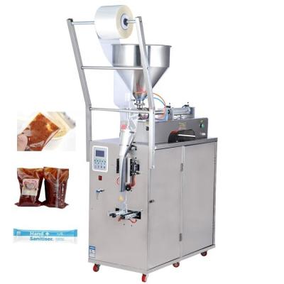 China Pneumatic Multi Function Food Oil Milk Packing Bag Pasta Sauce Pouch Sachet Liquid Fill Packing Machine for sale