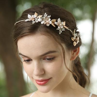 China Crystal Leaves Flower Pearl Luxury Handmade Fancy Headpiece Hair Accessories Metal Headpieces Bride for sale